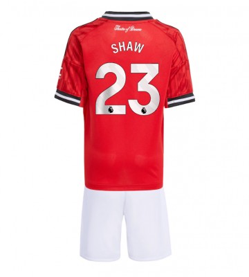 Manchester United Luke Shaw #23 Hjemmebanetrøje Børn 2025-26 Kortærmet (+ Korte bukser)